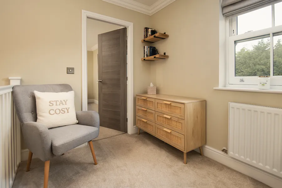 Armchair with a Stay Cosy cushion